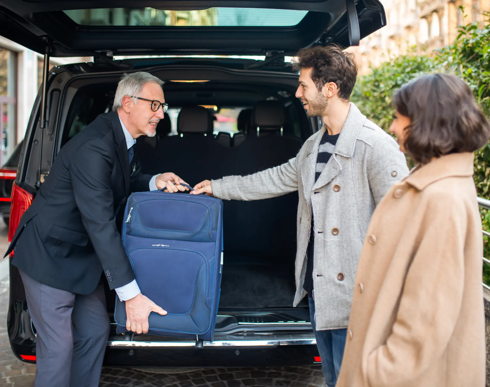 Cab My Ride Driver with Luggage